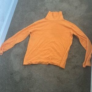 Orange turtleneck